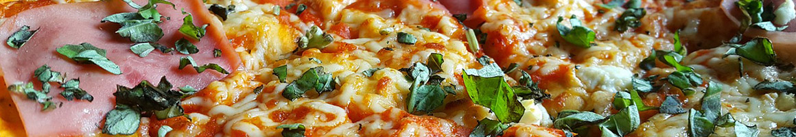 Eating Pizza at Acropolis Pizza restaurant in East Hampstead, NH.